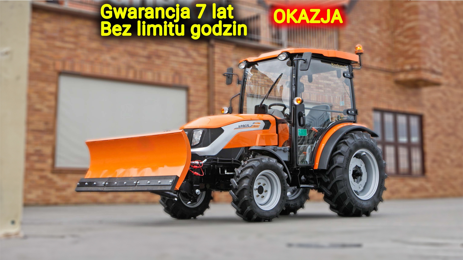 Ciągnik rolniczy Arbos 2040 z spychaczem Hydramet widok przodu z lewej strony