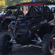 RZR Polaris 1000 S felgi aluminiowe klatka bezpieczeństwa pasy wersja dla dwóch osób kolor czarny klasyczna kierownica zawieszenie Walker Ewans Korbanek.pl