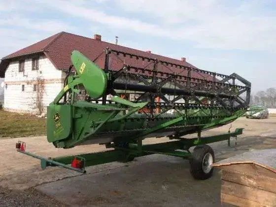 Zdjęcie hedera do kombajnu uzywanego John Deere 1450 CWS.