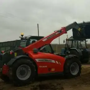 Załadunek obornika Ładowarka MF TH6030 na korbanek.pl