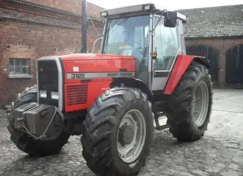 widok z lewego przody ciągnika MF 3125 stan techniczny i wizualny bardzo dobry