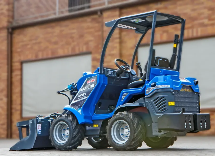 Multione seria 5 Kubota Korbanek tył bok ramię kabinę łyżka z dociskiem