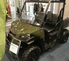 Ranger Polaris 570 EPS kolor zielony paka załadunkowa pasy bezpieczeństwa kierownica samochodowa pasy bezpieczeństwa zderzak przedni metalowy felgi stalowe napęd 2x4 4x4 EPS wspomaganie kierownicy klatka ochronna Korbanek.pl