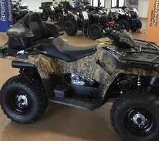 Sportsman Polaris 570 EPS Touring wspomaganie kierownicy kolor camo dodatkowe oparcie wersja dla dwóch osób felgi stalowe lusterka boczne napęd 4x4 2x4 Korbanek.pl