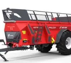 Czerwony rozrzutnik obornika N276 o ładowności 8 ton typ Falcon wyprodukowany przez Metal-Fach Sokółka