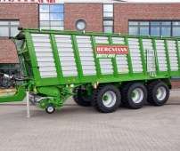 Duża przyczepa samozbierająca na układzie jezdnym typu TRIDEM firmy Bergmann model SHUTTLE