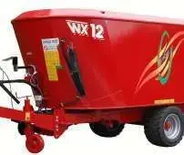 Zdjęcie przedstawiające wozy paszowe WX z firmy Metaltech, sprzedawane przez korbanek.pl.