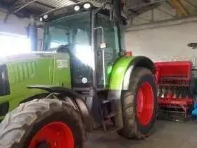 CLAAS Ares 657 ciągnik z silnikiem 6 cylindrowym turbo 125 KM