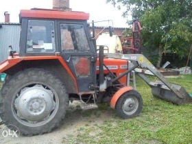 Ciągnik Massey Ferguson 255 z ładowaczem z łyżką korbanek kultowy stary 