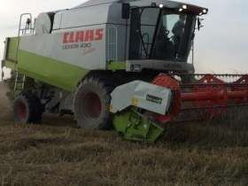 Używany Kombajn Claas Lexion 430 rok produkcji 2003 podczas pracy w polu