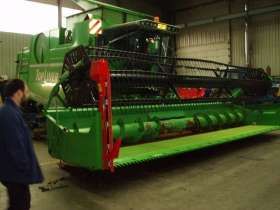 Zdjęcie zielonego używanego kombajnu zbożowego Deutz Fahr Topliner 8 XL 2000 r korbanek.pl