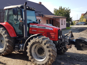 Ciągnik Massey Ferguson 6480 z obciążnikiem przedni