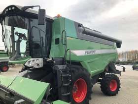 Kombajn zbożowy 6-klawiszowy FENDT 6335 C na utwardzonym placu widok z lewej strony