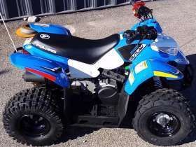 Limonkowy niebieski Quad Polaris Outlaw w ofercie www.korbanek.pl atv dla małych dzieci