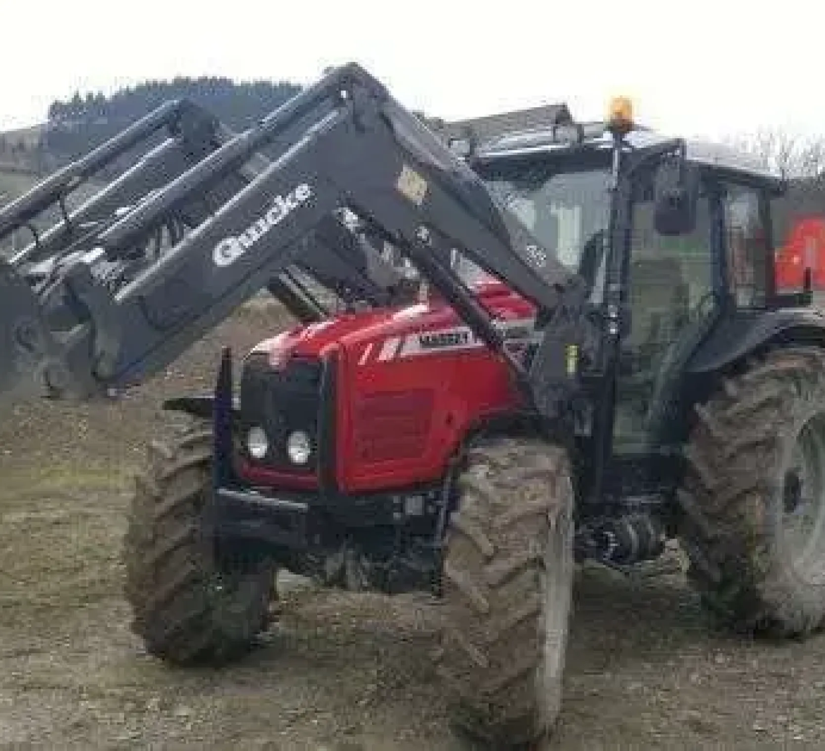 Używany Ciągnik rolniczy Massey Ferguson 4455 2006 r z ładowaczem czołowymlewy przód