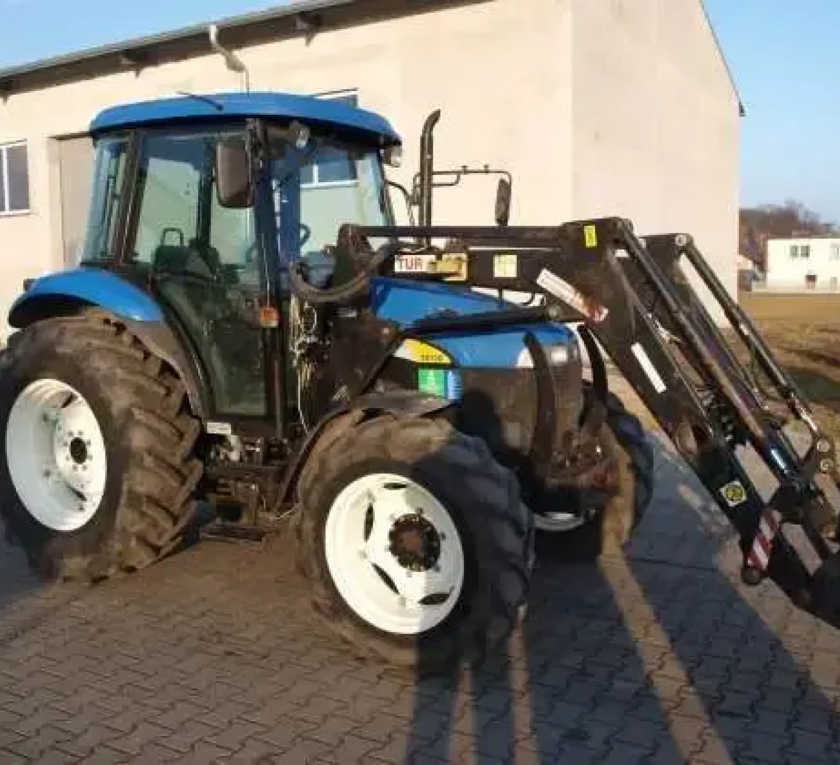 Ciągnik New Holland TD 70 z ładowaczem użuwany na korbanek.pl