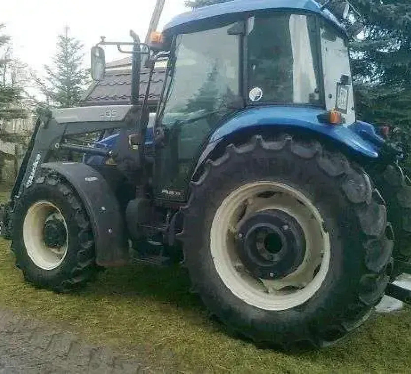 Ciągnik rolniczy New Holland TD80D Plus z ładowaczem używany