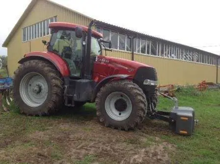 Ciagnik rolniczy używany z przednim TUZEM i obciąznikiem przednim marki CASE PUMA CVX 185