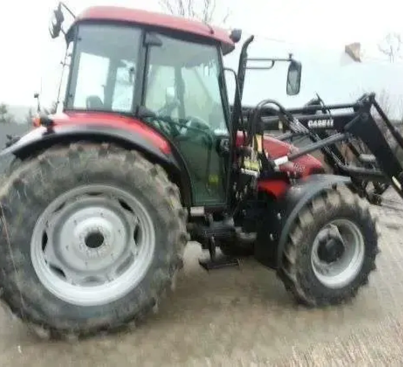 Używany ciągni rolniczy z ładowaczem czołowym CASE JX 95