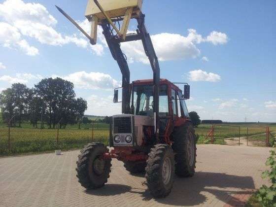 Używany Ciągnik rolniczy MTZ 82 z uniesionym wysoko ładowaczem Quicke