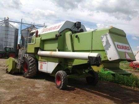 Używany Claas Dominator 98 S z hederem widok z lewej strony