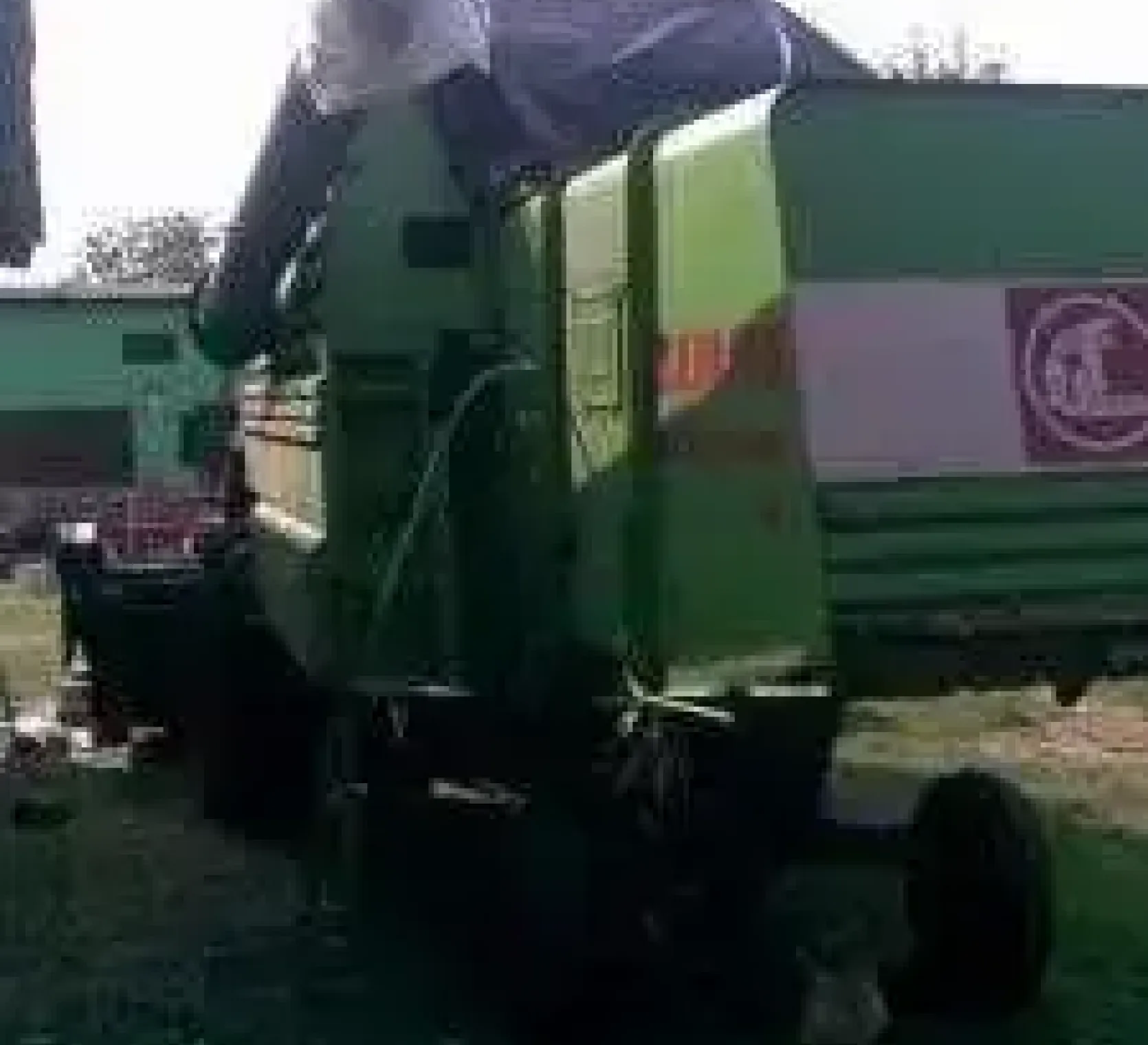 Używany Kombajn zbożowy Claas Mercator 70 z hederem widok z tyłu