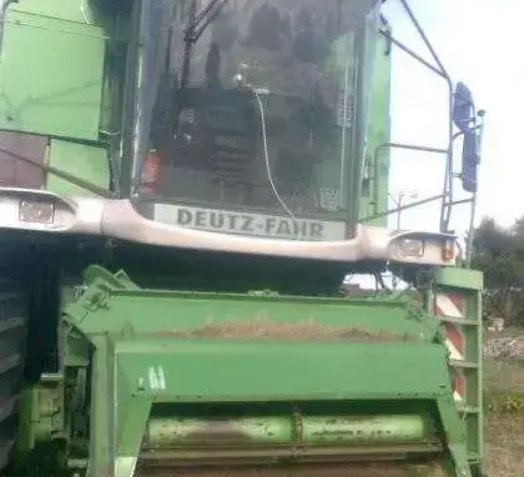 Widok zielony używany kombajn do zboża TOPLINER 8XL firmy Deutz-Fahr super cena korbanek.pl