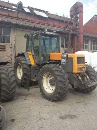 Żółty ciągnik Renault używany z 1994 roku 