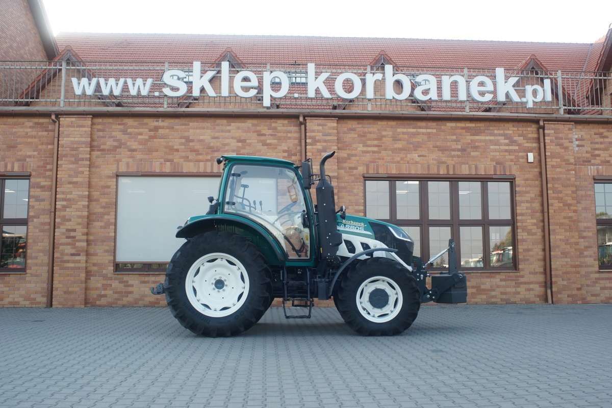 Traktor Arbos 5130 z obicaznikiem od boku