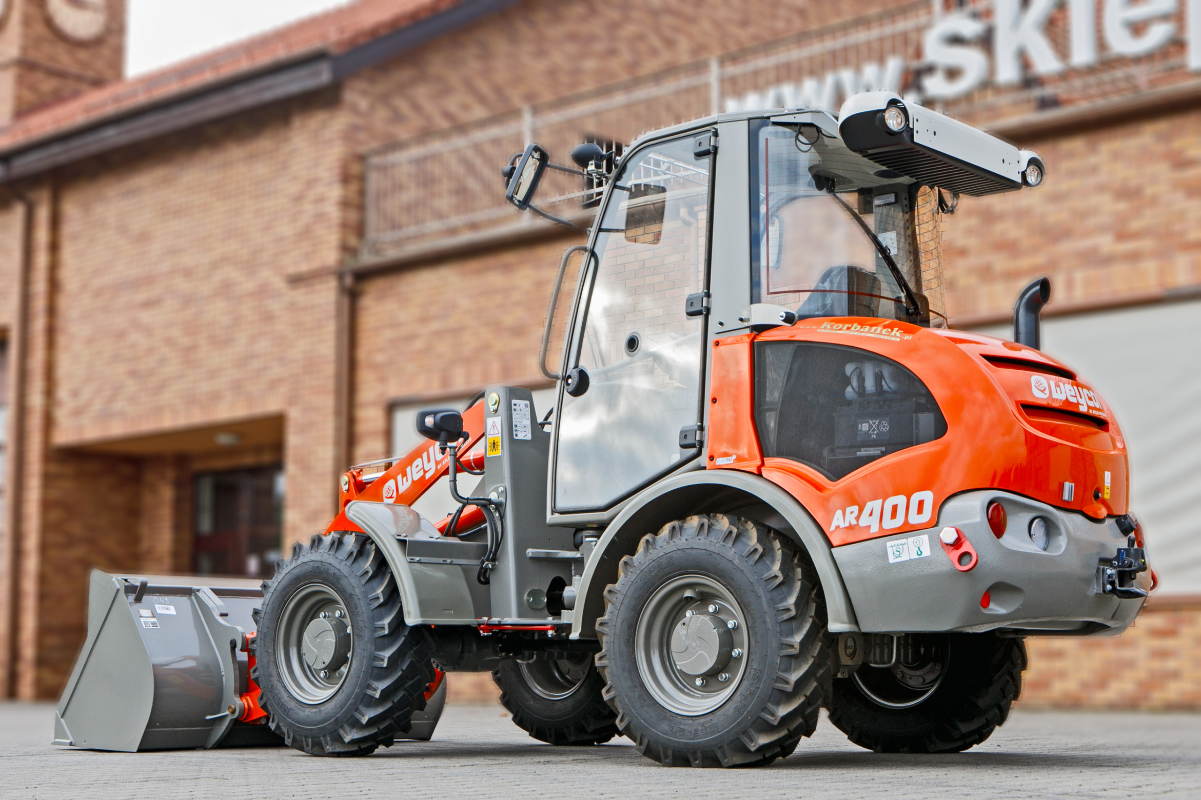 Ładowarka przegubowa Atlas Weycor AR400 Yanmar bok tył kabina klimatyzacja