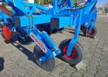 Krój talerzowy stabilizujący tor jazdy pielnika i koło podporowe Krój talerzowy stabilizujący tor jazdy pielnika i koło podporowe
