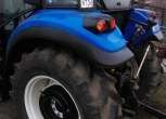 Koła z obciążnikami w ciągniku rolniczym New Holland TD5.75