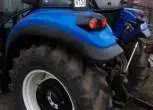 Koła z obciążnikami w ciągniku rolniczym New Holland TD5.75