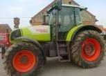 Jasnozielony ciągnik Claas Ares 826 