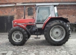 lewy bok ciągnika MF 3125 utrzymany w bardzo dobrym stanie prosty mocny solidny traktor