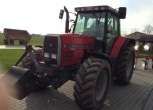 Ciągnik z obciążnikiem przednim MF 8110 z 1998 roku