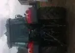 Tył traktora Massey Ferguson model 5465 120 KM tylne światła tylne opony tył kabiny 