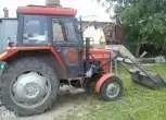 Ciągnik Massey Ferguson 255 z ładowaczem z łyżką korbanek kultowy stary 