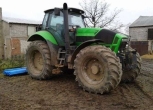 PRawy bok zielonego używanego ciagnika rolniczego Deutz Fahr X 710 