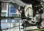 Kabina w używanym kombajnie zbożowym Claas Dominator  widok od środka 
