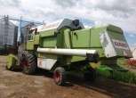 Używany Claas Dominator 98 S z hederem widok z lewej strony