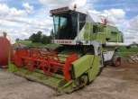 Używany Claas Dominator 98 S z hederem widok z przodu