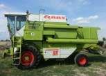 Używany Kombajn zbożowy Claas Dominator 86 zdjęcie lewej strony maszyny