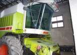 Używany Kombajn zbożowy Claas Mega 208 widok z lewej strony