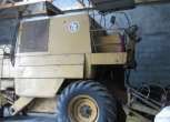 żółty bez kabiny używany kombajn zbożowy BIZON Z 056 1980 r