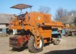 kombajn zbożowy BIZON Z 056 rok produkcji 1980 używny z daszkiem kolor pomarańczowy