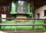 Zielony używany kombajn zbożowy Deutz-Fahr 5660 H rok produkcji: 2009 zdjęcie kabiny i hedera korbanek.pl