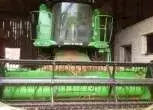 Zielony używany kombajn zbożowy Deutz-Fahr 5660 H rok produkcji: 2009 zdjęcie kabiny i hedera korbanek.pl
