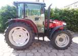 Ciągnik rolniczy Massey Ferguson 4707 widok z prawej  strony