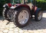 Traktor Massey Ferguson 4707 widok z prawej  strony